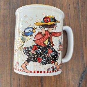 Mary Engelbreit ceramic “New Millennium” 10 ounce coffee mug